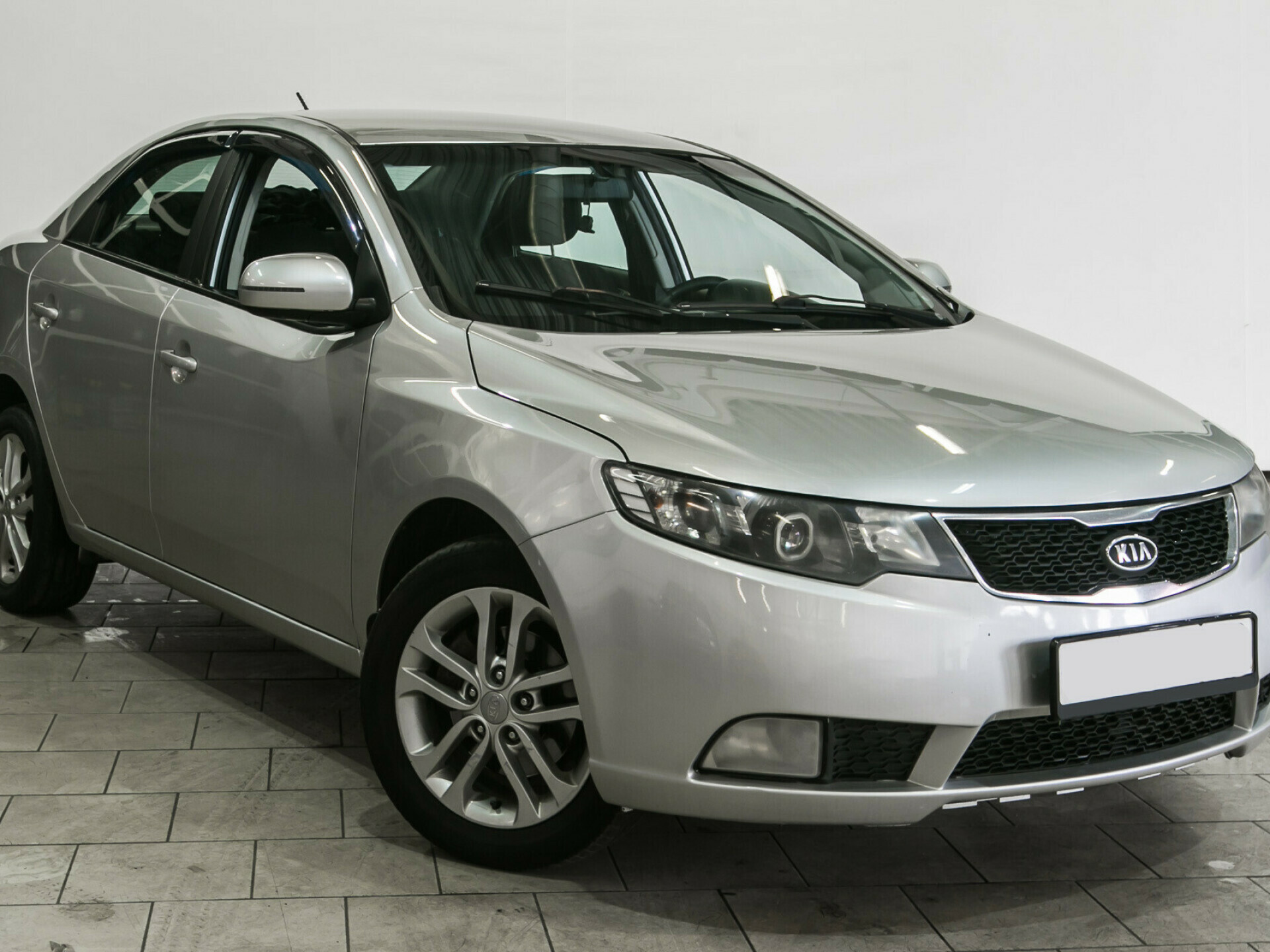 Kia Cerato, II 4-speed 1.6 AT (126 л.с.)