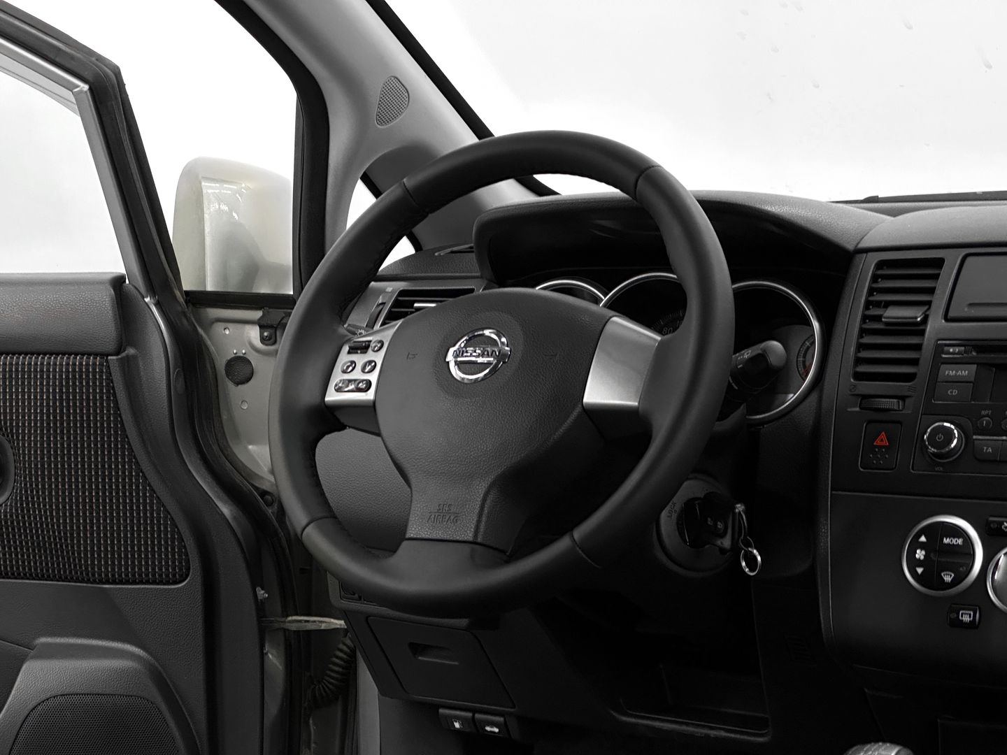Nissan Tiida, I Рестайлинг 1.6 MT (110 л.с.)